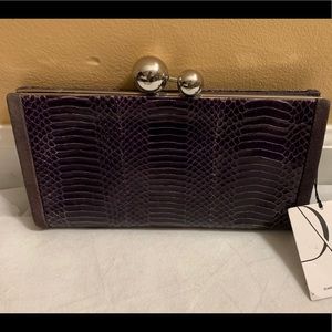 Diane Von Furstenberg snake skin clutch